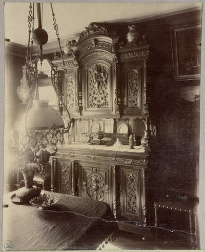 Interior of the home of an employee in the Louvre shops, rue St. Jacques, Paris, 1910 by Eugène Atget